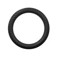 Black motorcycle front tire with deep tread pattern, size 130/60B19, round profile.