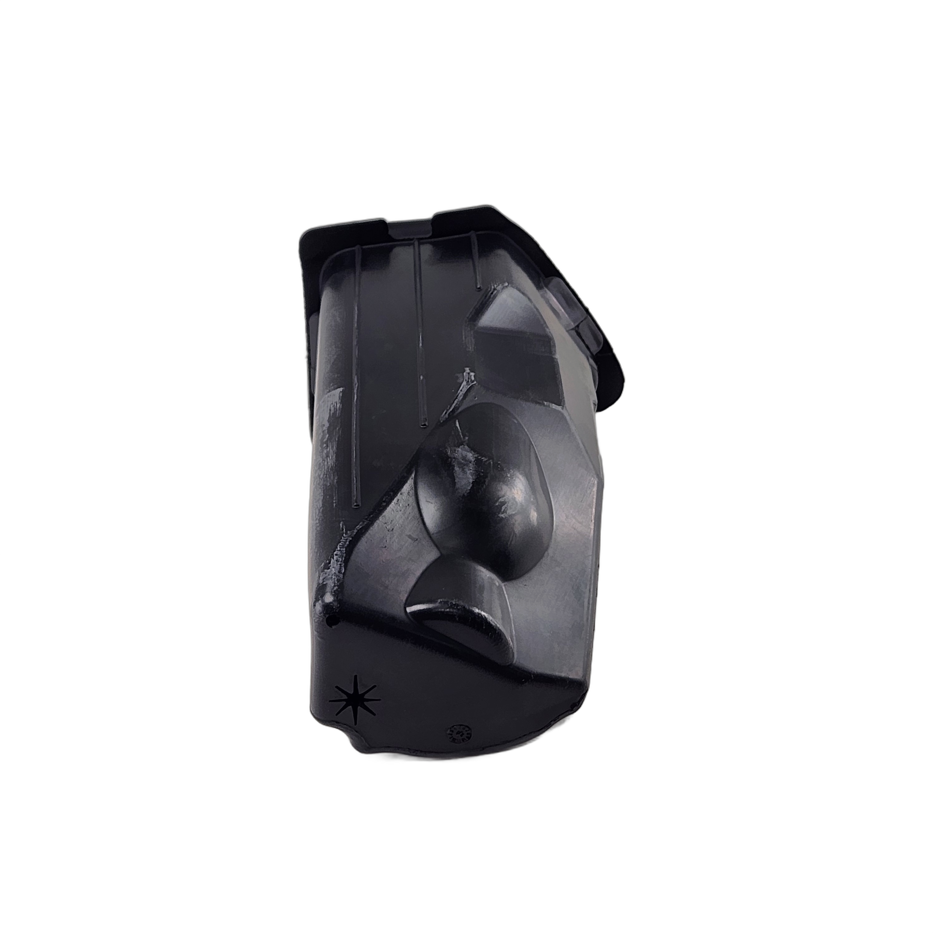 A black, rectangular plastic Storage-Liner Right Hand by Polaris with angular surfaces, molded details, a circular indentation, and a small star-like symbol at one end is shown isolated on a white background—perfect as an OEM Polaris part.