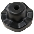 Black molded rubber winch bumper with a round hole center and flared edges.