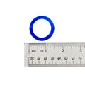 Blue circular clutch limiter spacer ring next to white ruler showing size about 1 inch diameter.