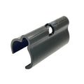 Black plastic brake line retainer clip with a curved channel and central locking mechanism.