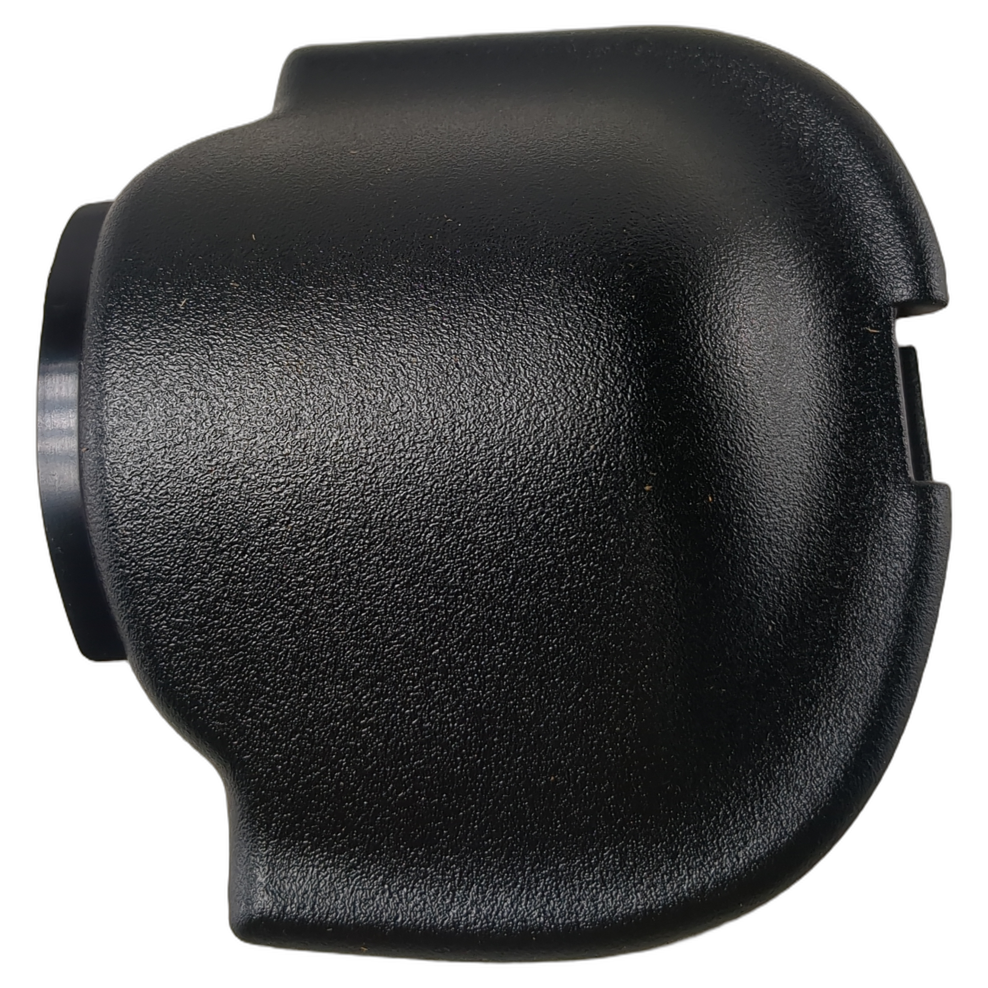 Matte black textured plastic left-hand door compartment cover with rounded edges and recessed center area.