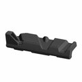Glossy black molded plastic floor panel with textured grip areas and contoured design.