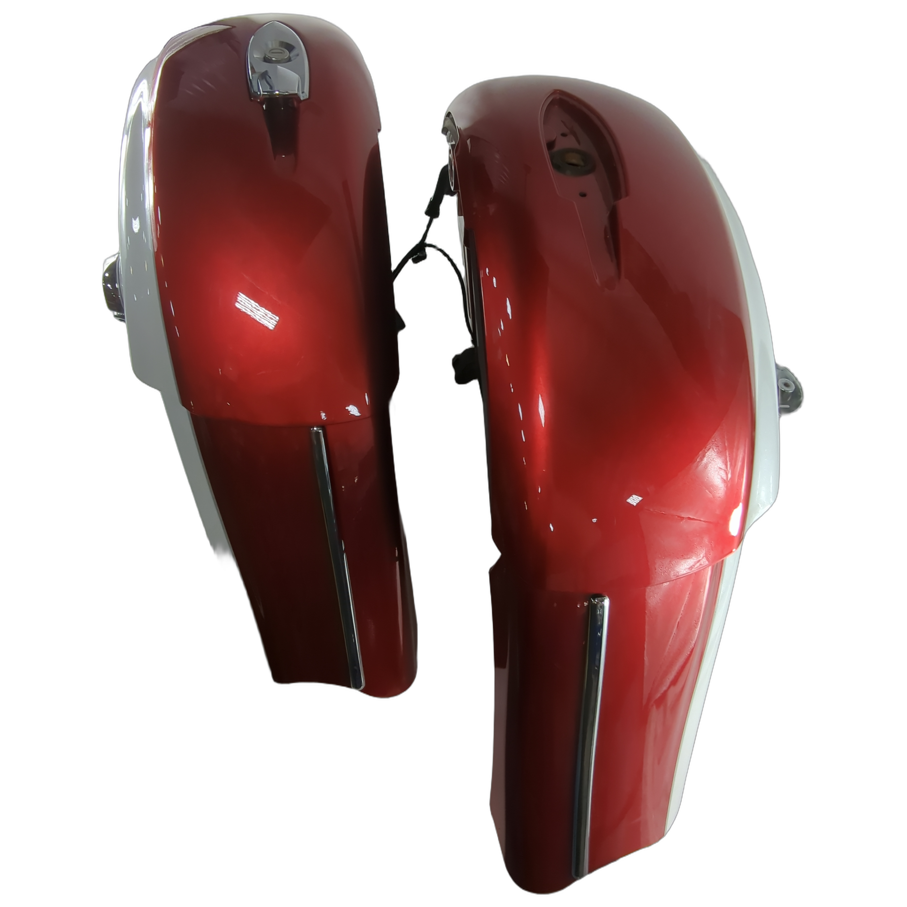 Pair of glossy red and white motorcycle saddlebags with streamlined shape and integrated locks.