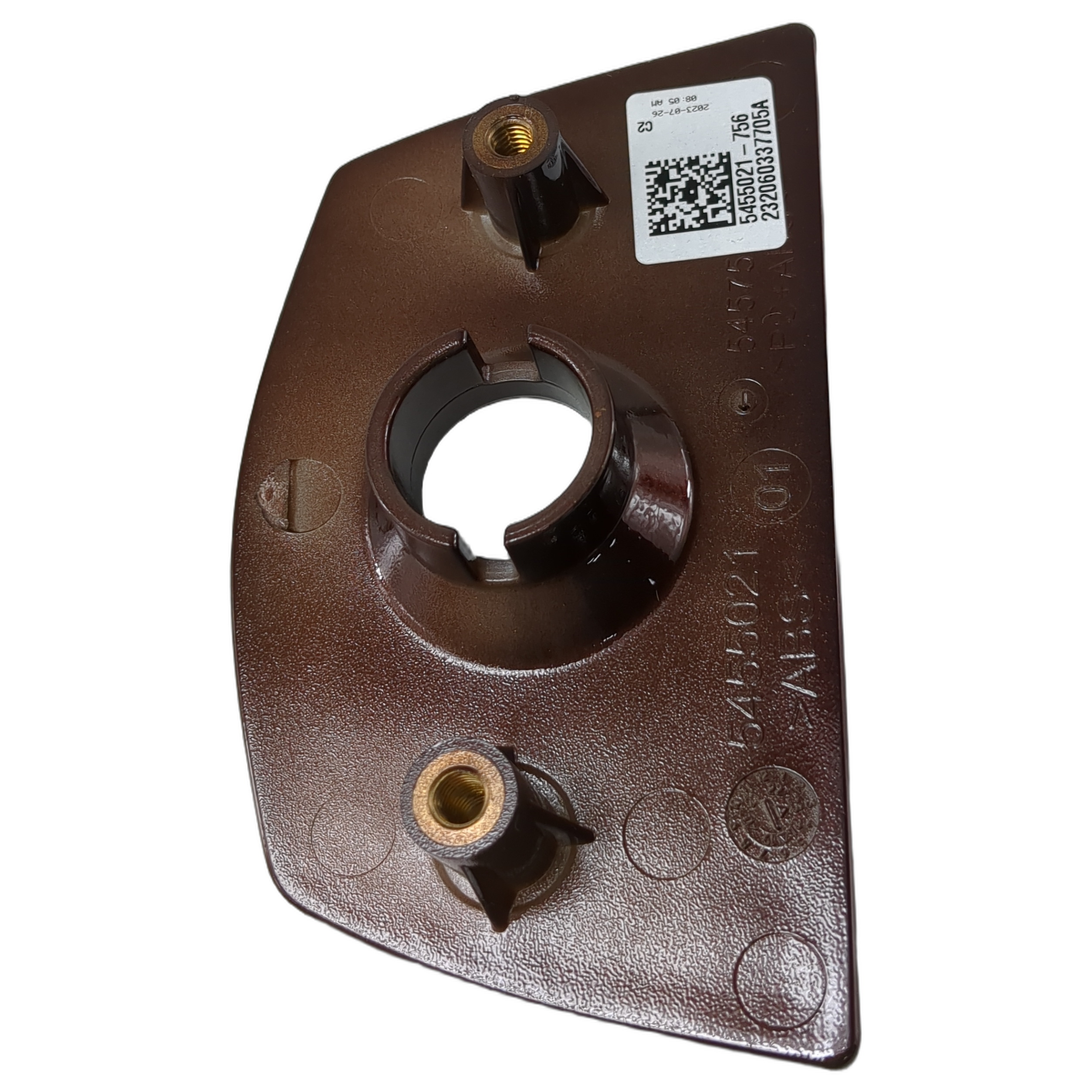 Brown triangular plastic saddlebag lock bezel with two brass inserts and a QR code label.