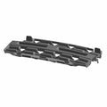 Black plastic lower grille with angular, geometric open slats for airflow and protection.