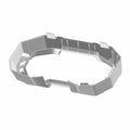 Black angular plastic dash panel bezel with multiple mounting tabs and textured detailing.