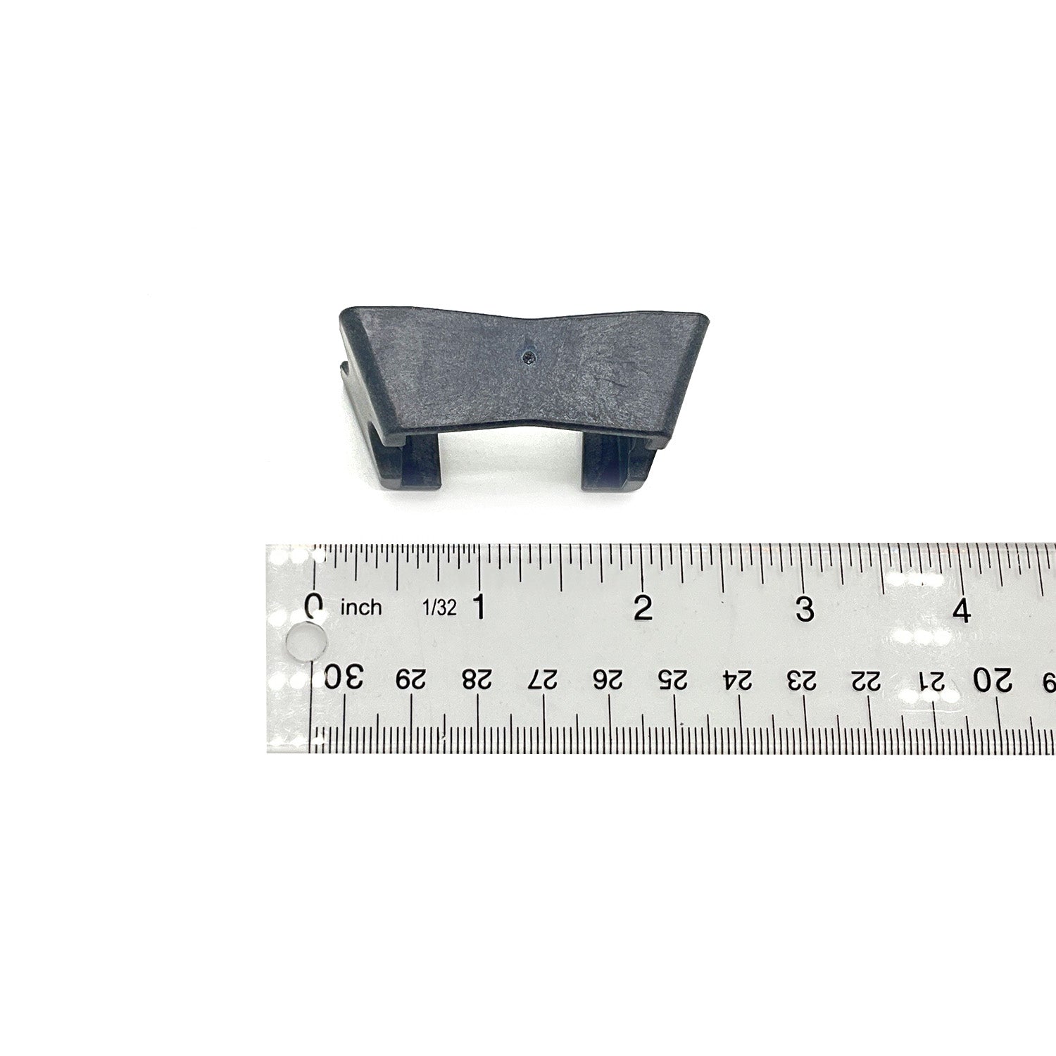 Black heavy-duty plastic Polaris Slider Drive part measuring about 1.5 inches wide.