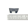 Black heavy-duty plastic Polaris Slider Drive part measuring about 1.5 inches wide.