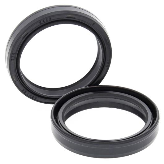 Black rubber fork seal kit with ridged outer edges, designed for motorcycle suspension forks, 43mm diameter.