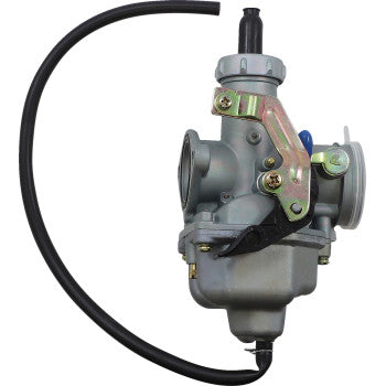 Gray metal motorcycle carburetor with attached black fuel hose and gold-toned adjustment lever.