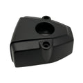 Matte black triangular ignition cover with two mounting holes and a recessed circular center.