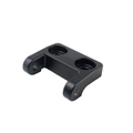 Black cast metal chassis hinge with left-hand orientation and two circular recesses.