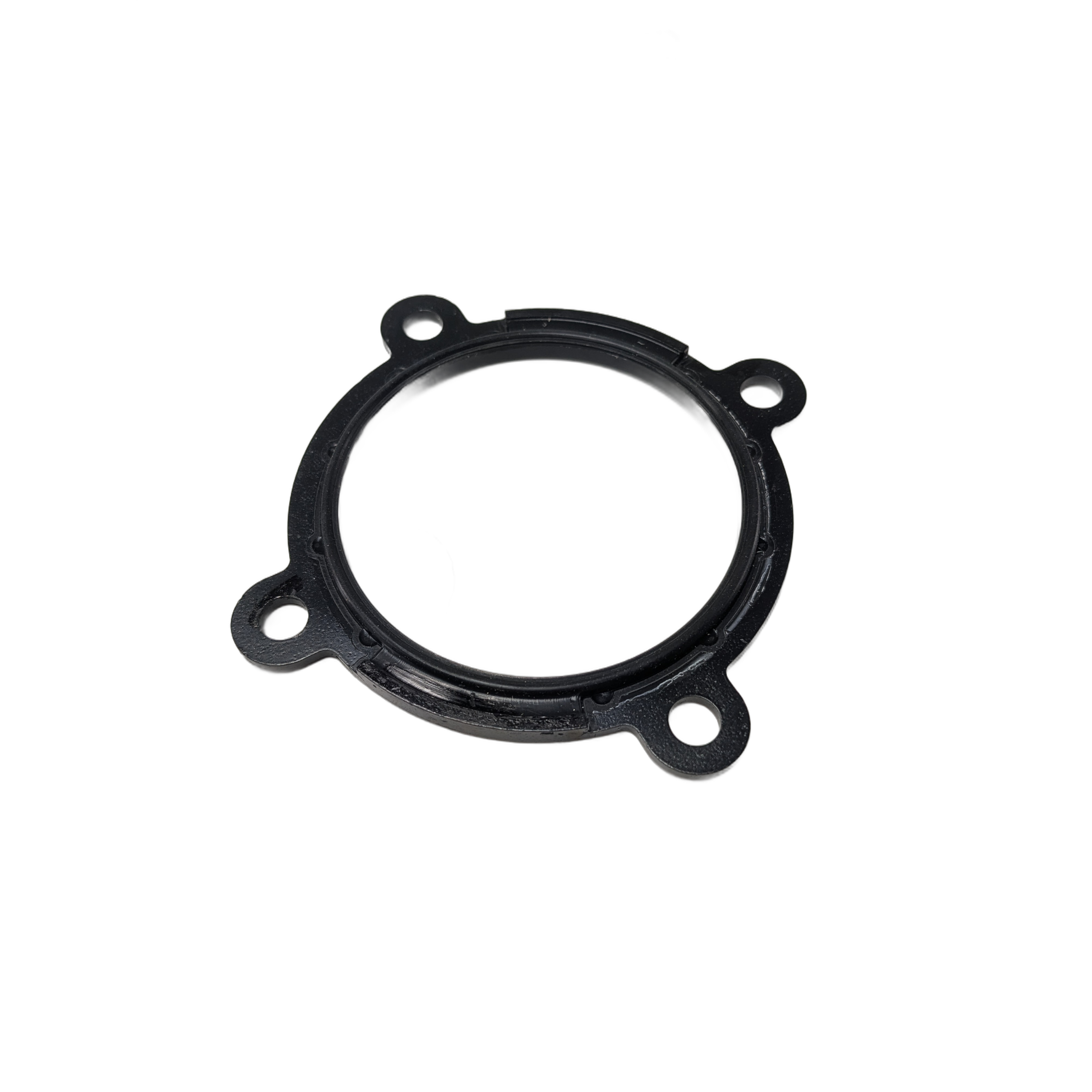 Black circular gasket with four mounting tabs and holes, rubber material seal.