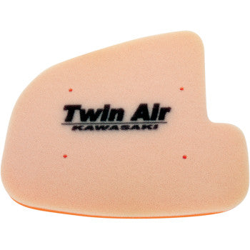 The Kawasaki Standard Air Filter by Twin Air is a beige, dual-stage foam filter with KAWASAKI in black. Its rounded, asymmetrical design fits Kawasaki motorcycles to optimize airflow and boost engine protection.