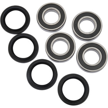 The Viking Yamaha Wolverine Wheel Bearing Kit Front by Pivot Works is shown with four black rubber seals and four silver/black double-sealed ball bearings, arranged in two rows on a white background.