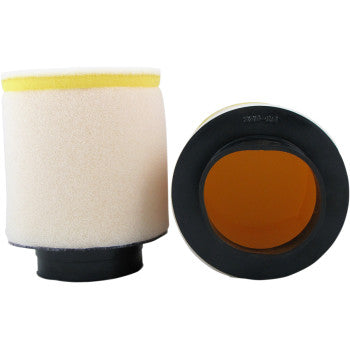 Two Honda Foam Air Filters by No Toil are shown; one stands upright, revealing its cream exterior and yellow rim, while the other lies on its side to highlight a black rubber opening and orange interior for superior filtration.