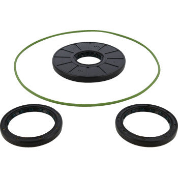 The Polaris Differential Seal Kit Rear by Moose Offroad includes four circular rubber seals—three black in varying thicknesses and one thin green ring—arranged on a white background, perfect for differential servicing.