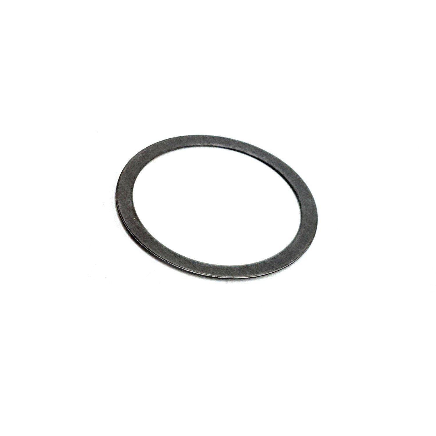 Black circular tensioner gasket with a thin flat profile and smooth surface.