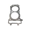 Metal cylinder head gasket with multiple bolt holes and two large circular openings for engine cylinders.