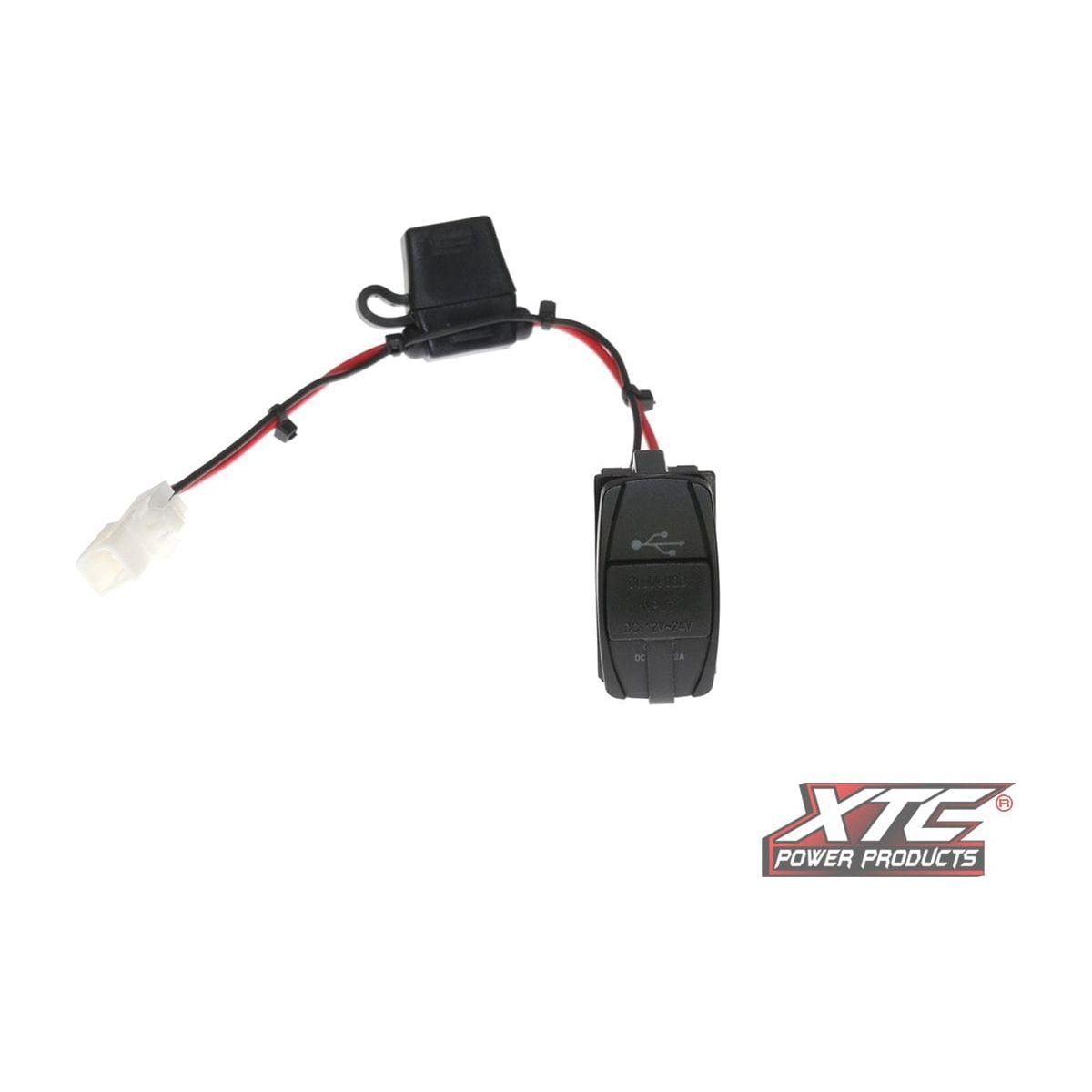 The Plug N Play Dual USB Power Can by XTC Power, shown with attached wiring, connectors, and a fuse holder on a white background, features the XTC Power Products logo in the bottom right corner.