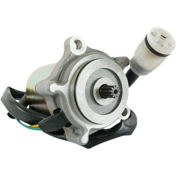 Silver metal shift control motor with black wiring and white plastic connector plug.