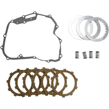 The Complete Clutch Kit by Vesrah includes four metal clutch discs, four brown-segmented friction plates, a gasket, and four small coil springs—all displayed on a white background.
