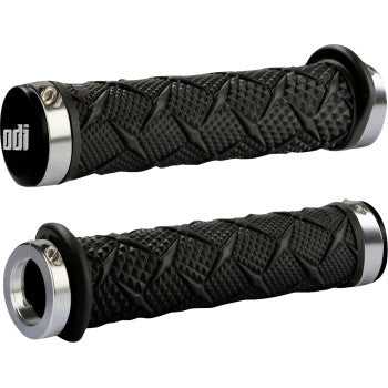 The Grips Xtreme Lock-On Black / Silver by Odi feature a textured, diamond-patterned surface and silver lock rings for secure, slip-free performance, with the odi logo on the inner caps.