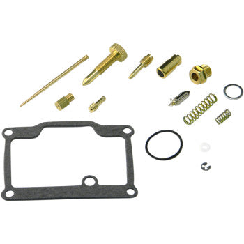 The Polaris Carburetor Repair Kit by Shindy includes jet needle sets, float valves, brass jets, springs, gaskets, O-rings, and small fittings neatly arranged on a white background.