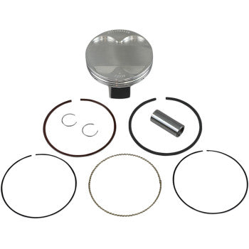 The Suzuki Piston Kit 95.50 mm by Wiseco includes a forged 4-stroke piston, five piston rings, two retaining clips, and a wrist pin—arranged on a white background and ideal for high-performance engines.