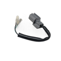 The Link Cable Front Turn Light by CFMOTO is a gray automotive electrical connector with attached wires, black sheathing, and two clear plastic terminals—perfect for ATV off-road accessories or CFMOTO OEM parts—shown on a white background.