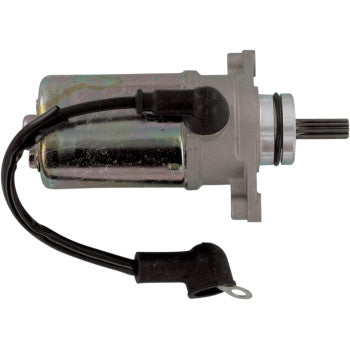 Compact metallic Yamaha starter motor with silver casing, black wiring, and mounting flange.