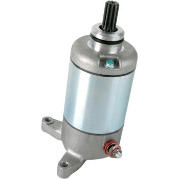 Silver cylindrical starter motor with metallic mounting brackets and black spline shaft.