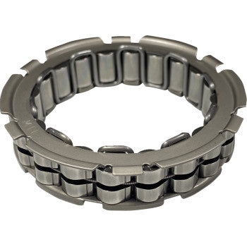 Metallic circular one-way starter bearing with evenly spaced roller components and toothed outer edge.