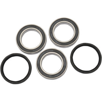 Set of three metal sealed wheel bearings and two black rubber seals for rear wheel assembly.
