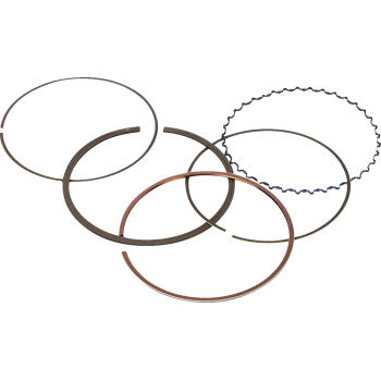 Five piston rings from the Vertex Piston Ring Set 80.00 mm OD for Replica and High Compression Pistons are shown on a white background; four are smooth and circular, while one features a distinctive wavy profile.