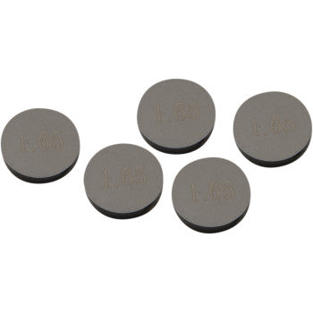 Five round, flat, gray Valve Shim 9.48 mm x 1.65 mm pieces by Prox are arranged on a white background, highlighting their precision machined construction and maximum durability. Sold as a 5 pack.