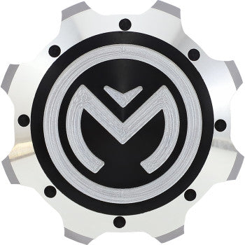 The Polaris Gas Cap Silver Black by Moose Offroad is a round CNC-machined aluminum gas cap with a black center and silver M logo, gear-like edges featuring smooth and notched segments, plus a rubber seal to prevent fuel leakage.