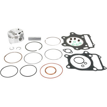 The Honda Piston Kit with Gaskets 76.00 mm by Wiseco features a piston kit, piston rings, gaskets, seals, and small metal parts arranged neatly on a white background.