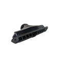 Black plastic air conditioner defrost vent with angled slats and mounting features.