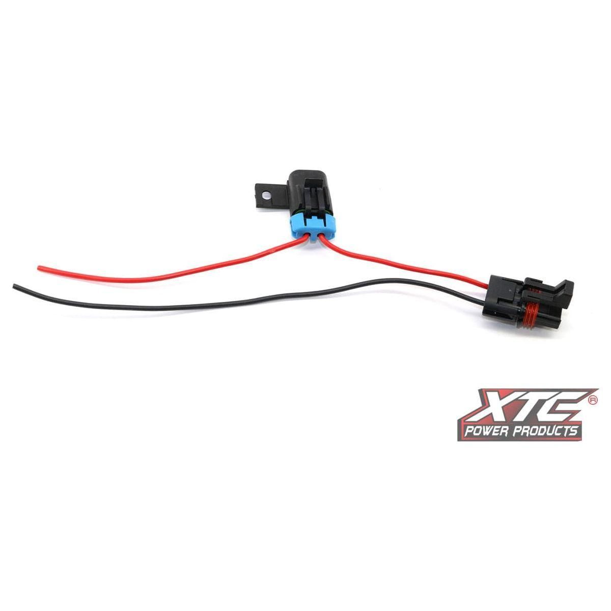 The Plug N Play Bus Bar Adptr Full Power Pol by XTC Power is a compact automotive wiring harness with black and red wires, two connectors, a mounting tab, and the XTC Power Products logo in the lower right corner.