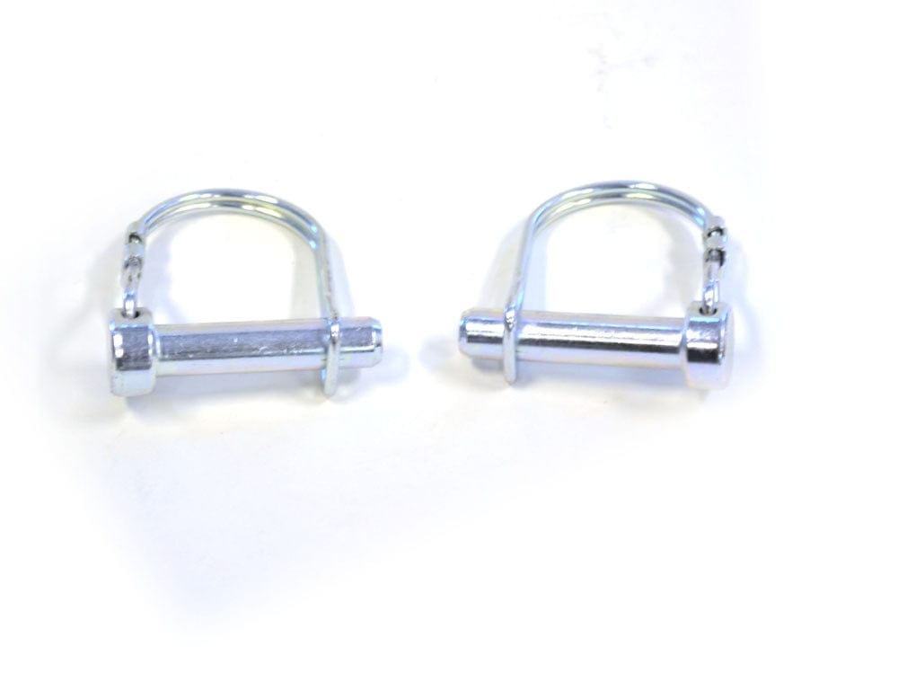 Two Snow Plow Clevis Pins by Warn with silver metal D-shaped wire handles are placed side by side on a white background.