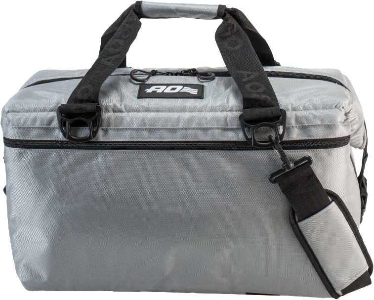 The 36 Pack Capacity Ballistic Silver Cooler by AO Coolers features gray ballistic fabric, black handles, a detachable shoulder strap, zippered top, and AO logo patch. This insulated leak-proof cooler is ideal for outdoor adventures.