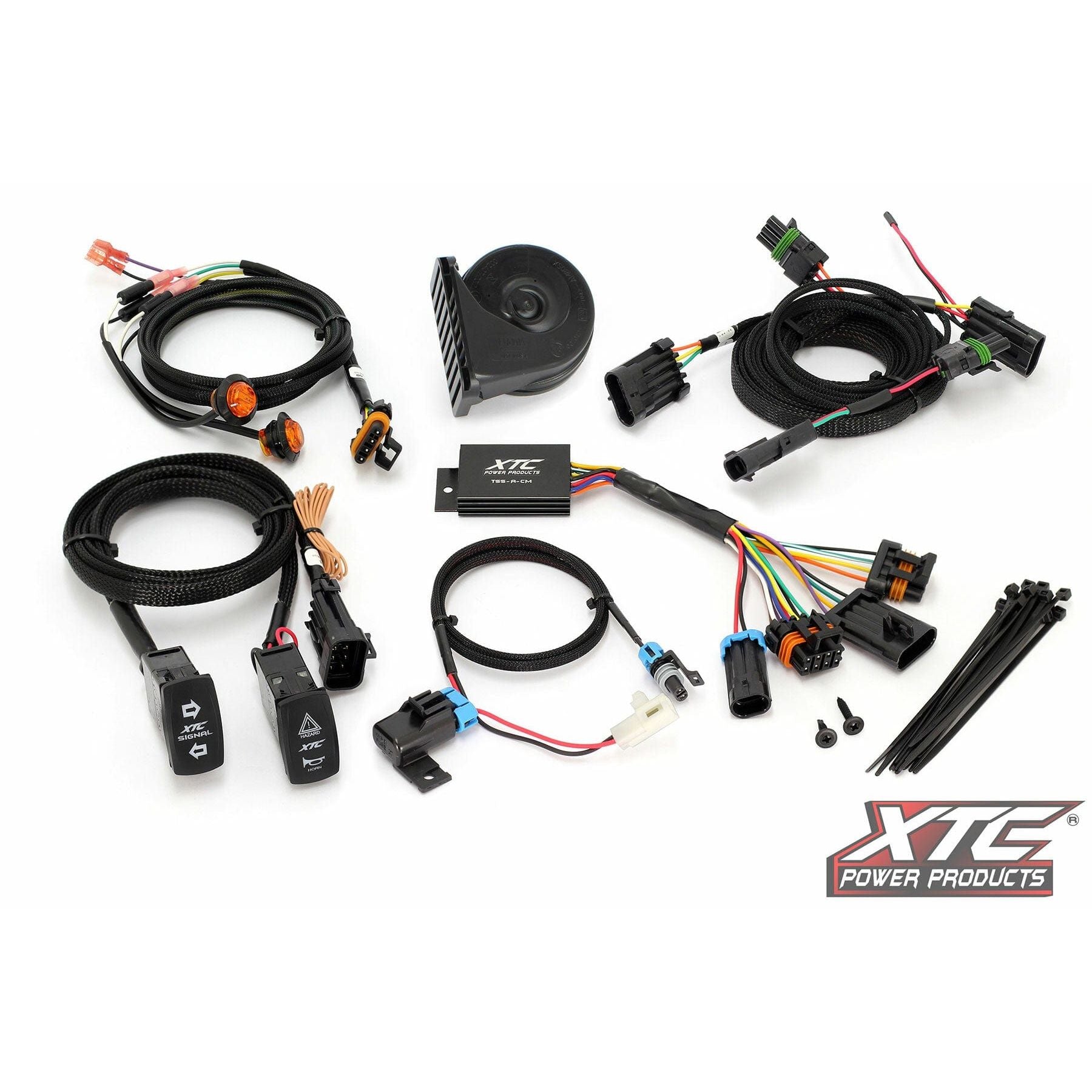Self Canceling Turn Signal Kit by XTC Power displayed on a white background with harnesses, switches, connectors, horn, zip ties, labeled parts, and the XTC Power logo in the bottom right corner.