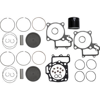 The Kawasaki Top End Kit 85.00 mm by Wsm includes gaskets, piston rings, pistons, a piston sleeve, and pins for 4-stroke engines, all components arranged neatly on a white background.