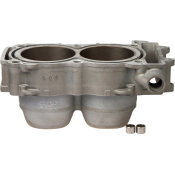 Silver aluminum twin-cylinder engine block with smooth bore and visible mounting points, two small cylindrical metal spacers