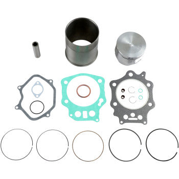 The Honda Sleeve and Piston Kit by La Sleeve, featuring a cast cylinder sleeve, piston, gaskets, rings, and wrist pin, is arranged neatly—ideal for your next 2-stroke kit or top-end rebuild—displayed on a white background.