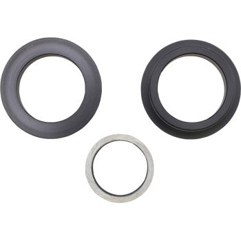 The Arctic Cat - Textron Shock Bearing Kit Back Lower by Moose Offroad features three washers arranged by size and color on a white background: two larger dark washers and one smaller silver metallic washer.