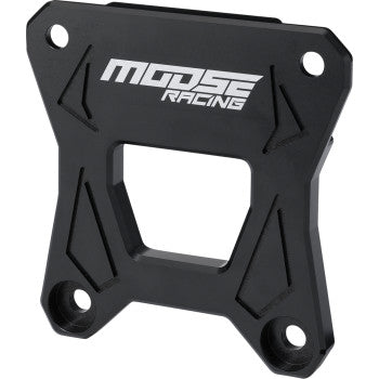 The Radius Rod Plate by Moose Offroad is a black, rectangular billet-machined bracket with a center cutout, four mounting holes, an angular design, and the Moose logo in white—designed as an OEM replacement for your radius rod plate.