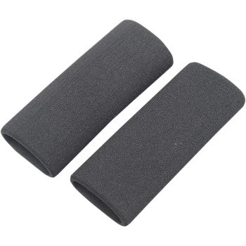 Two black Grab On Grip Covers, each 1-1/2" x 5", cylindrical in shape, are placed side by side on a white background—ideal as shock-absorbing handlebar or motorcycle grip covers.